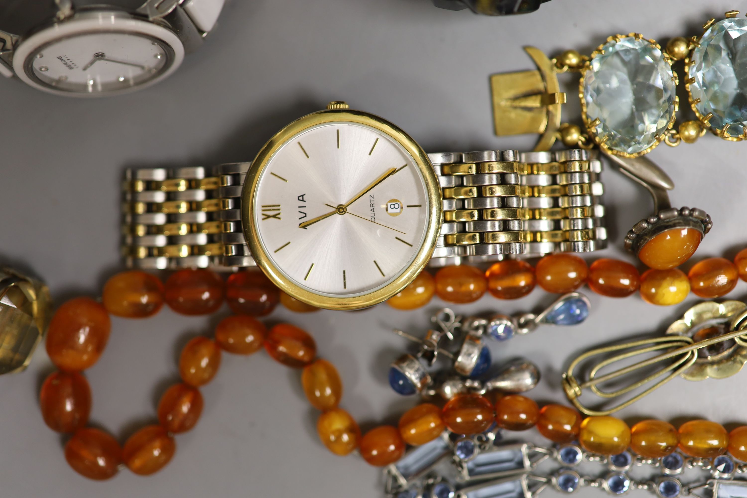 An amber necklace, costume jewellery, watches, etc.